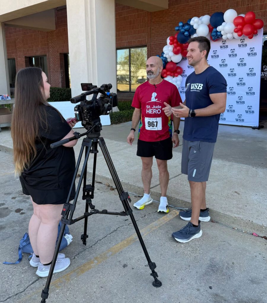 Dustin Wright from WSB being interviewed about the 5K Run for St. Jude